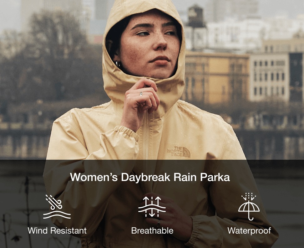 An image of a woman wearing a beige Daybreak Parka.