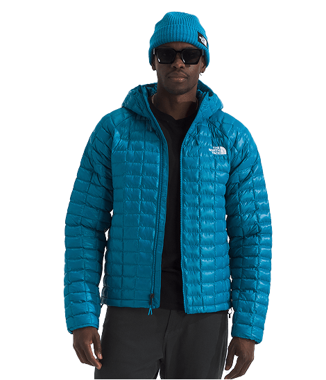A man wearing a blue Terra Peak jacket from The North Face