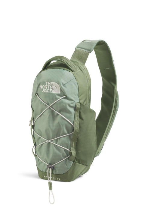 Light green sling backpack.