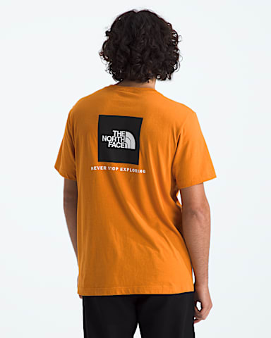Mens Evolution Box NSE Regular ShortSleeve Tee TNF Dust Orange HERO
