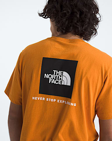 Mens Evolution Box NSE Regular ShortSleeve Tee TNF Dust Orange HERO2