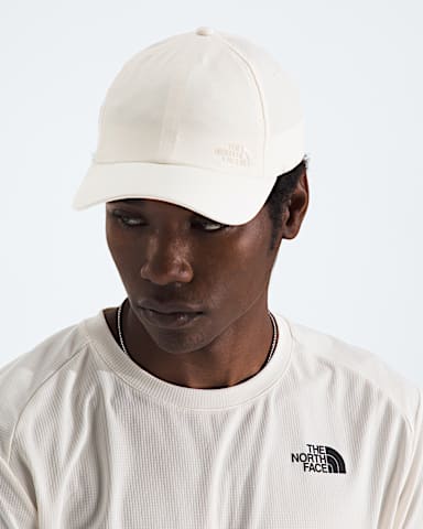 Never Stop Hat TNF White Dune MODELBACK