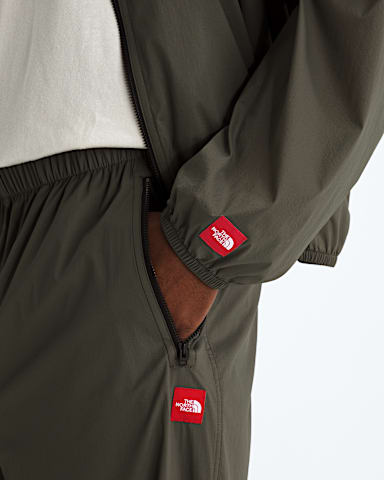 Unisex TNF Red Box Packable Wind Pants TNF New Taupe Green HERO3