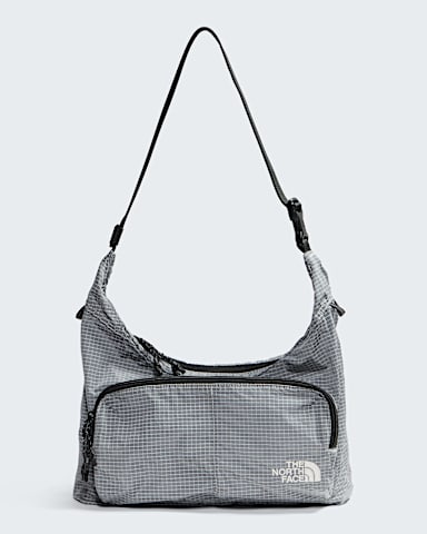 Never Stop Crossbody TNF Cumulus Cloud HERO