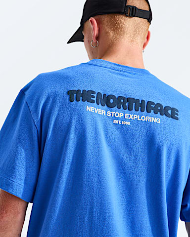 Mens Explore Fonts Relaxed ShortSleeve PCT TeeGraphic TNF Active Blue HERO2