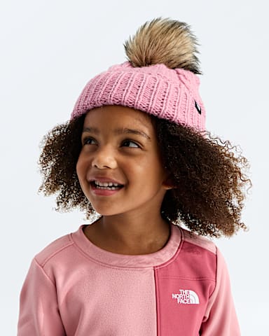 Kids Oh Mega Fur Pom Beanie TNF Primrose MODELBACK
