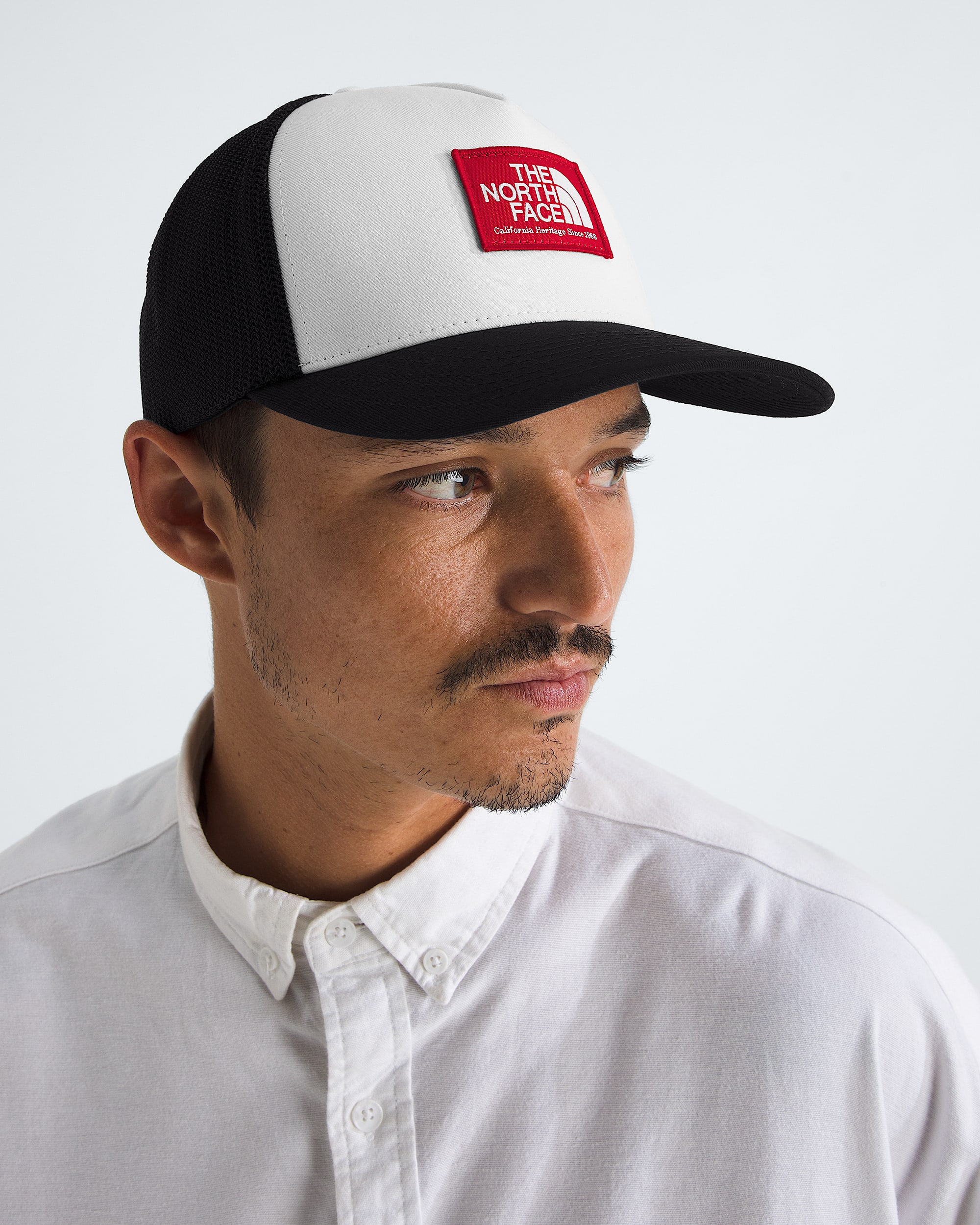 Keep It Patched Trucker Hat TNF MODELBACK