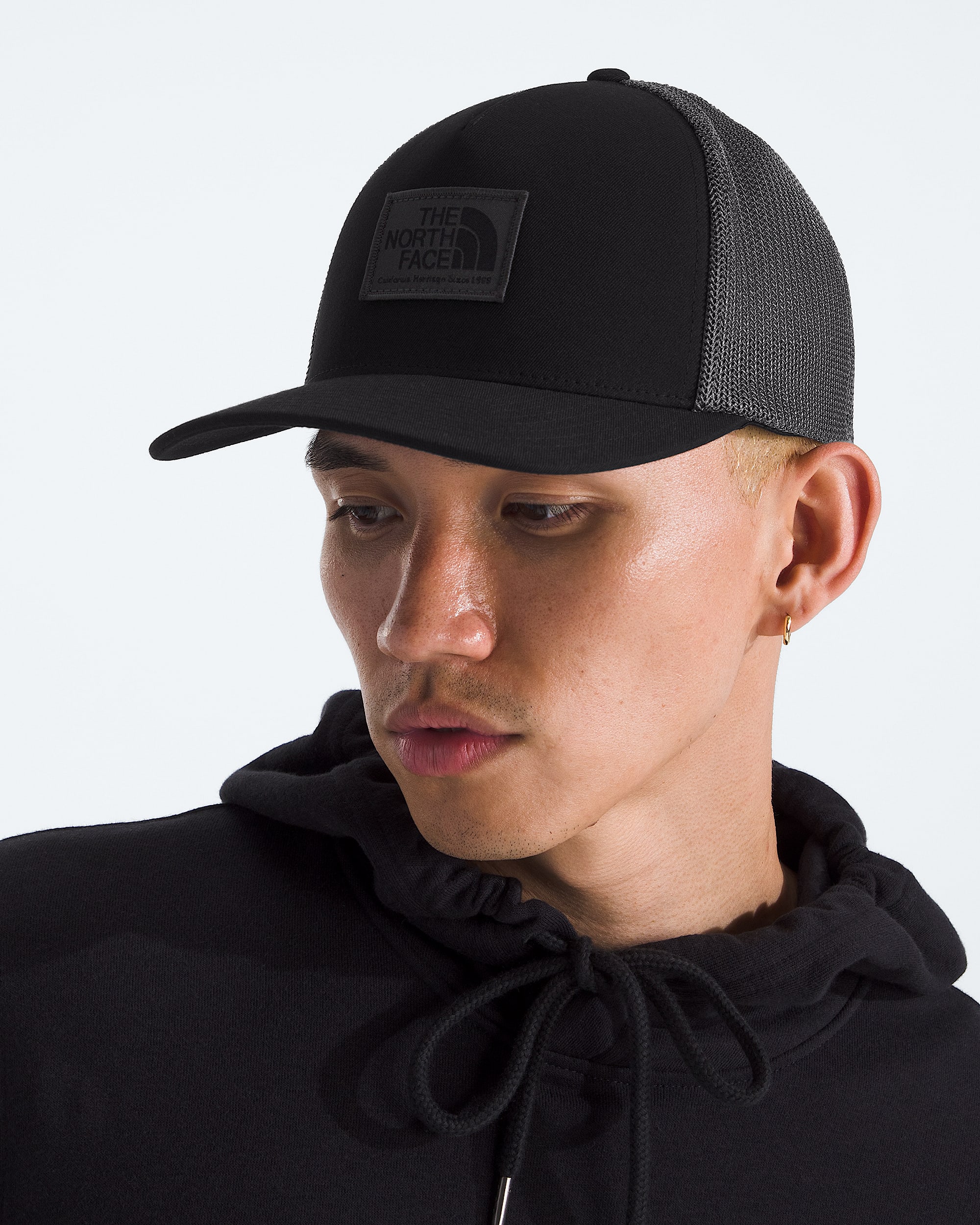 Keep It Patched Trucker Hat TNF MODELBACK