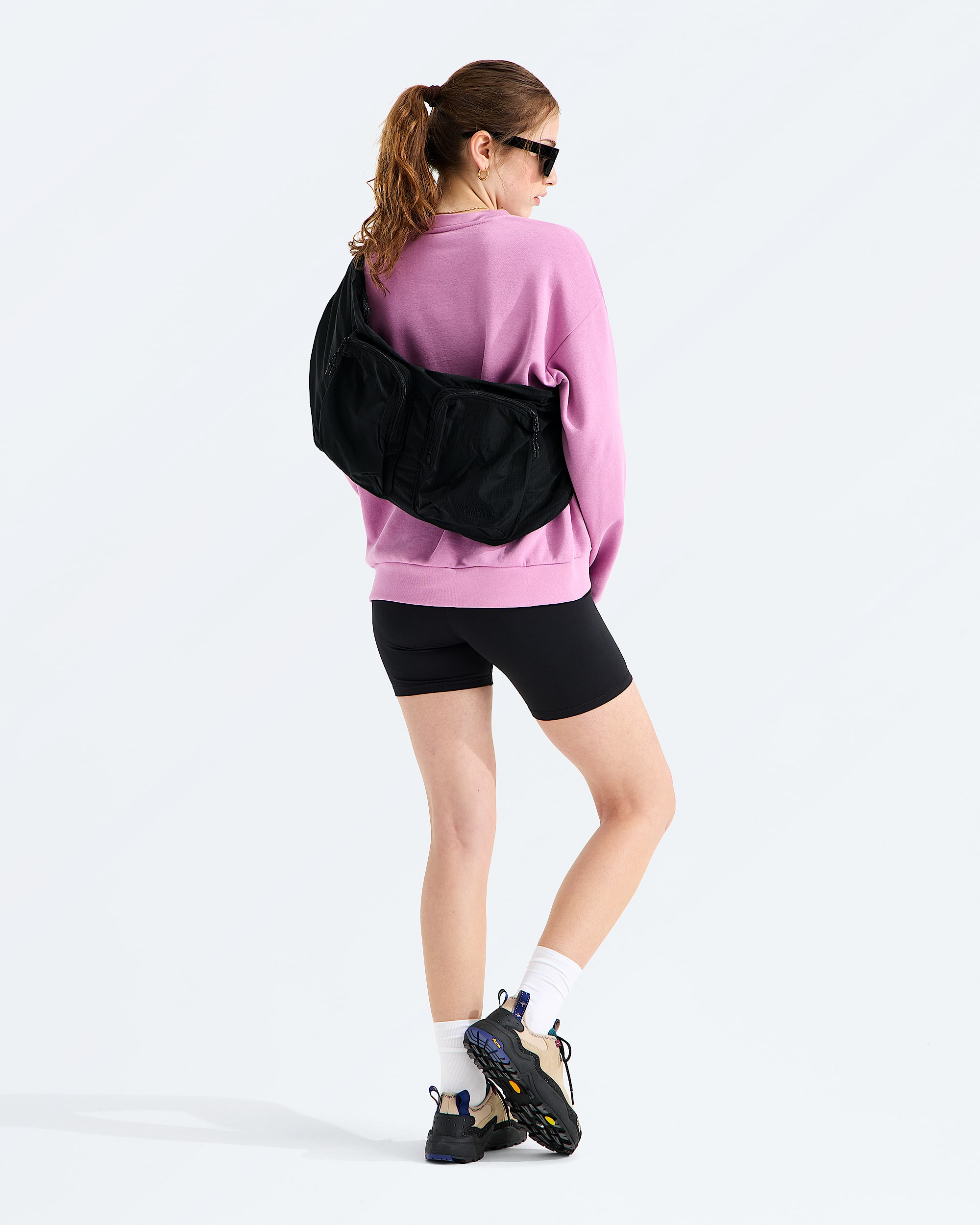 Never Stop Utility Sling TNF MODELBACK