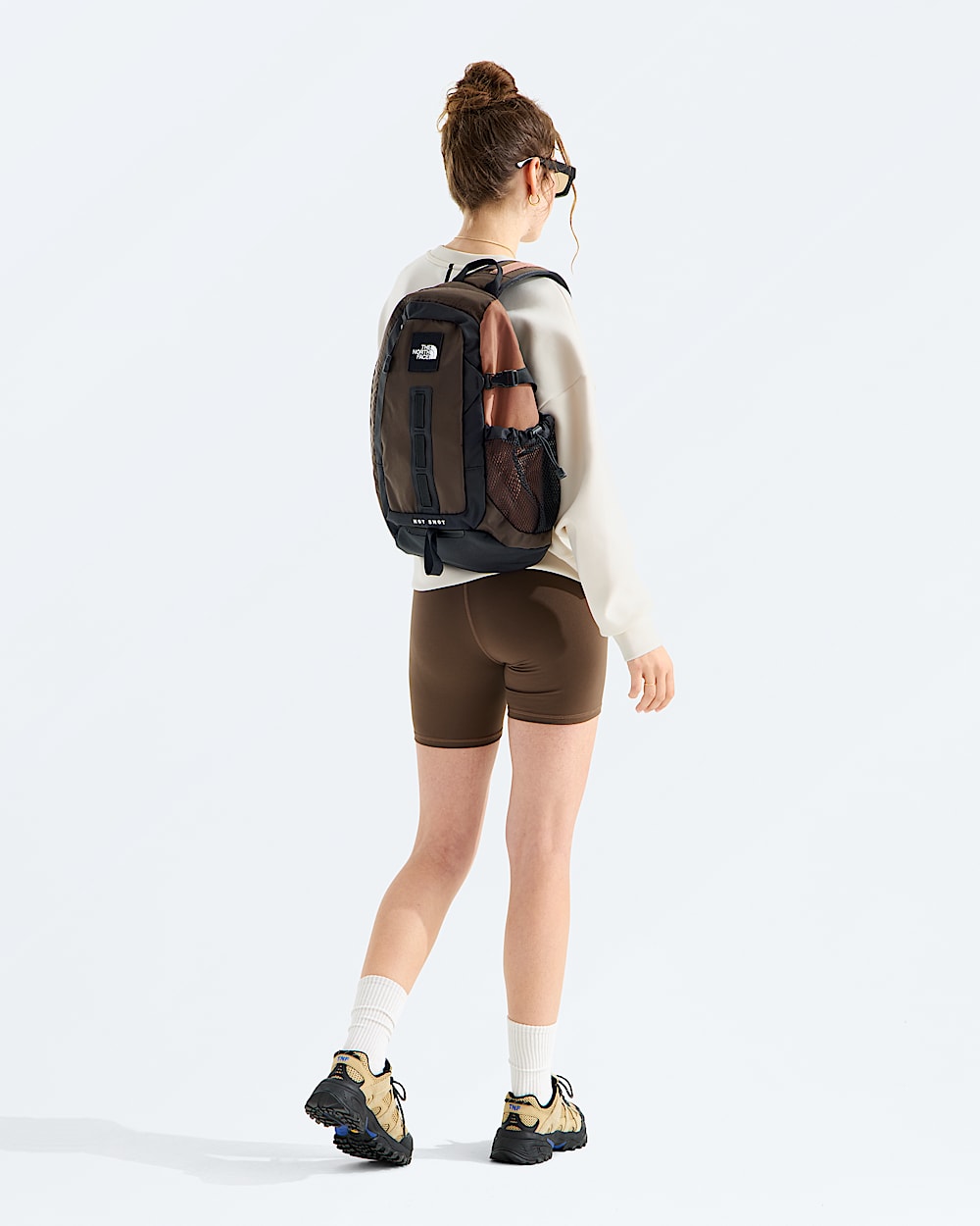 north face backpack straps short The Hot Shot Mini White Dune/Desert Stone It features a central compartment for larger items The North Face Fall Line