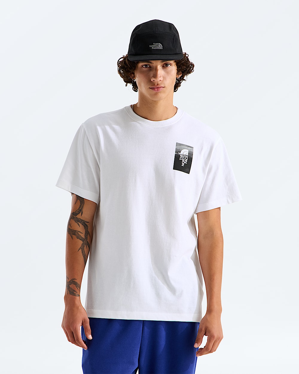 Mens Apex 75 Collage Relaxed ShortSleeve Tee TNF BACK