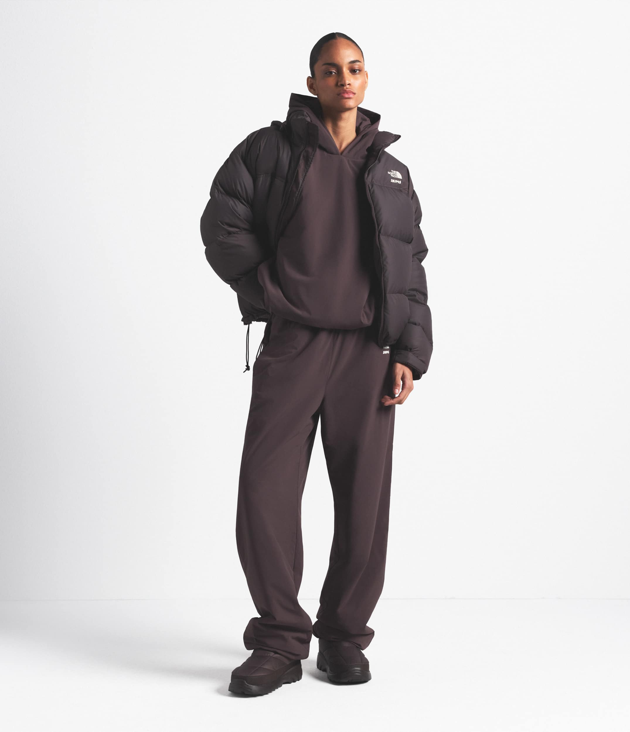 Manteau Nuptse 1996 The North Face x SKIMS TNF Phnix Sk HERO2