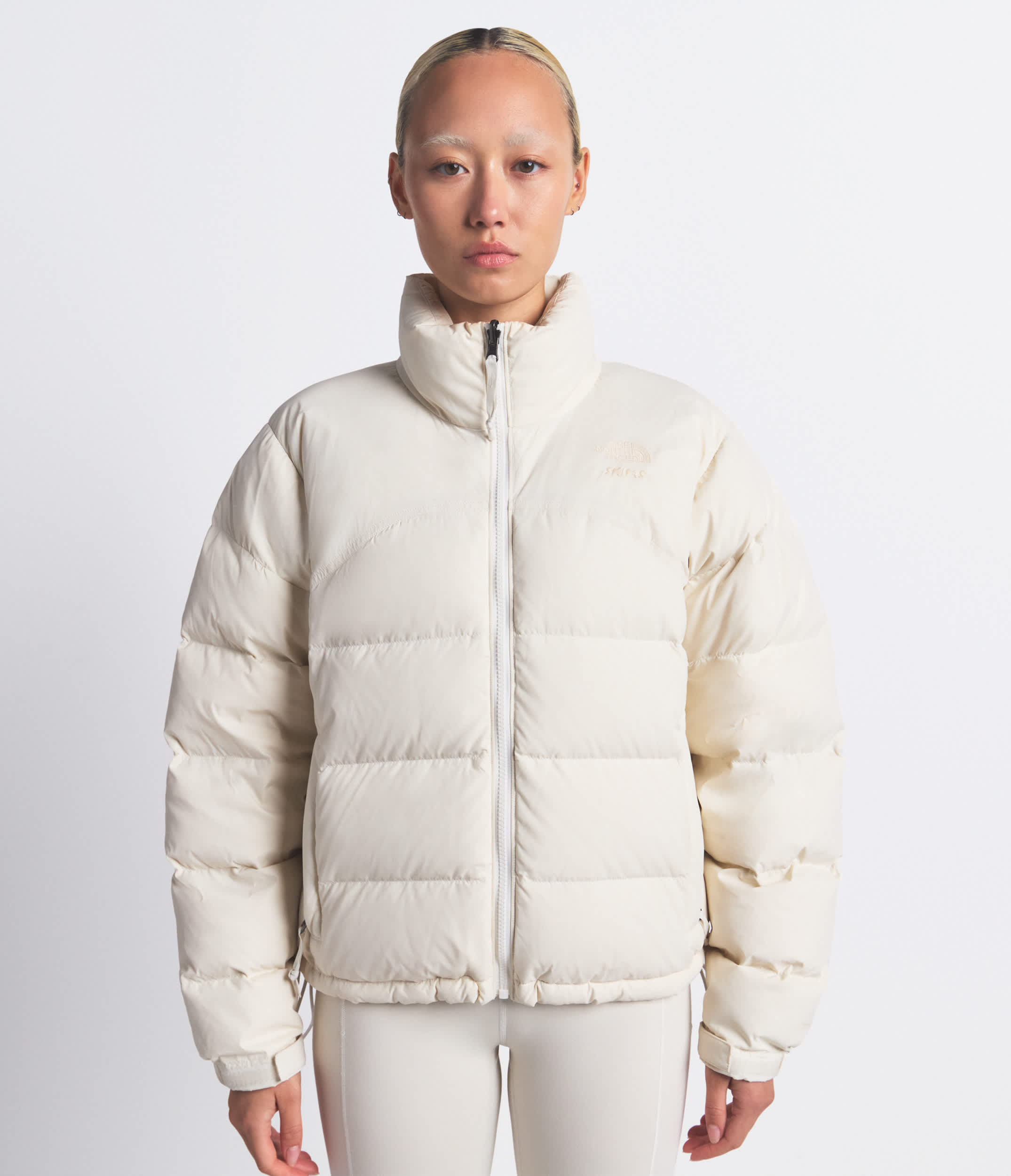 The North Face X SKIMS Womens 2000 Retro Nuptse Jacket TNF HERO