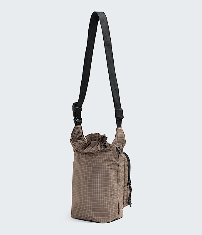 Never Stop Bucket Bag TNF BACK